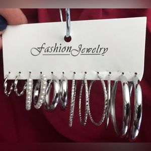 6 pair of silver hoops